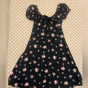 Altar’d State black dress with floral design and bow in front. Size XSmall